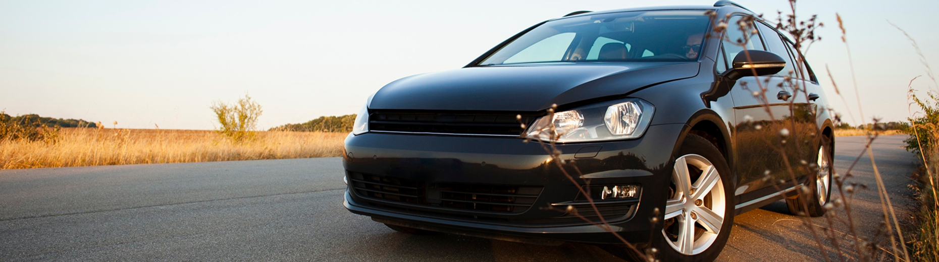 Black car on an open country road